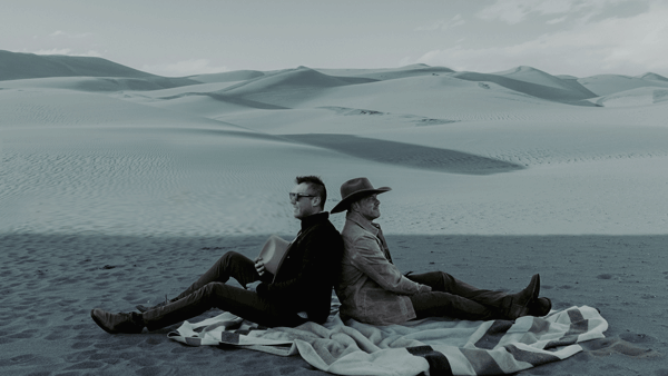 Christopher H. Conn (right) with fiancé David